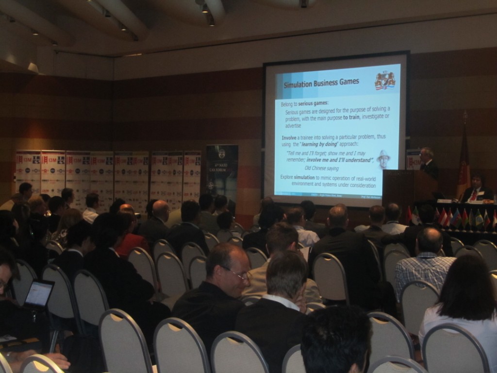 	I3M2011 / CAX Forum Opening - Plenary Speakers: Prof.Yuri Merkuryev presents the use of M&S in Supply Chain Management	