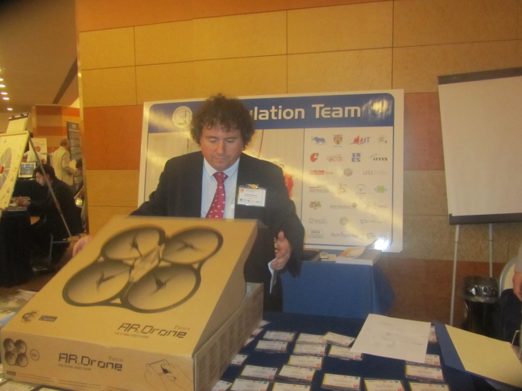 	I3M2011 - Prof.Bruzzone with Parrot Drone at I3M Conference Desk	